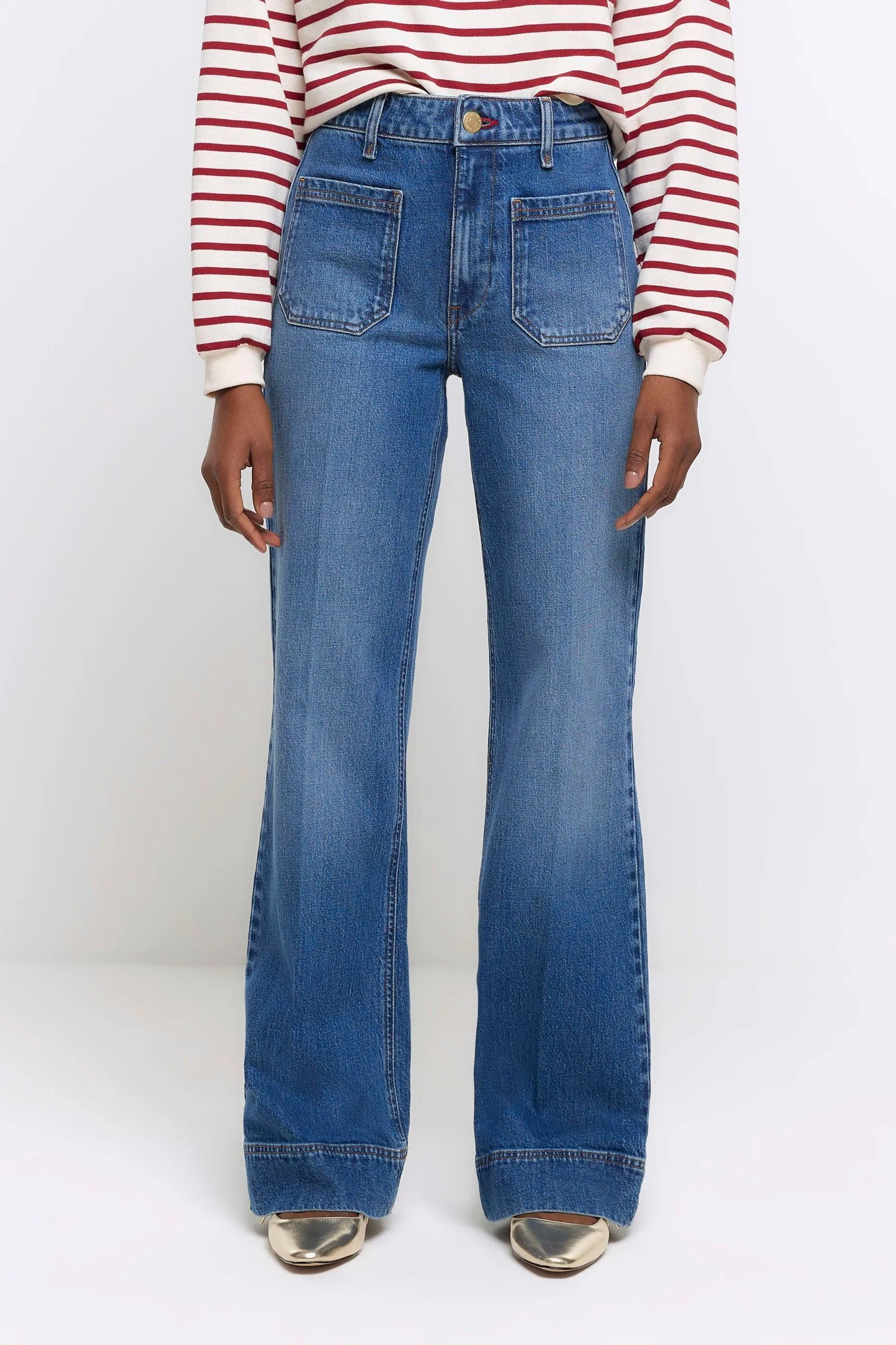 River Island - Jeans a vita alta con fondo ampio e tasca anteriore